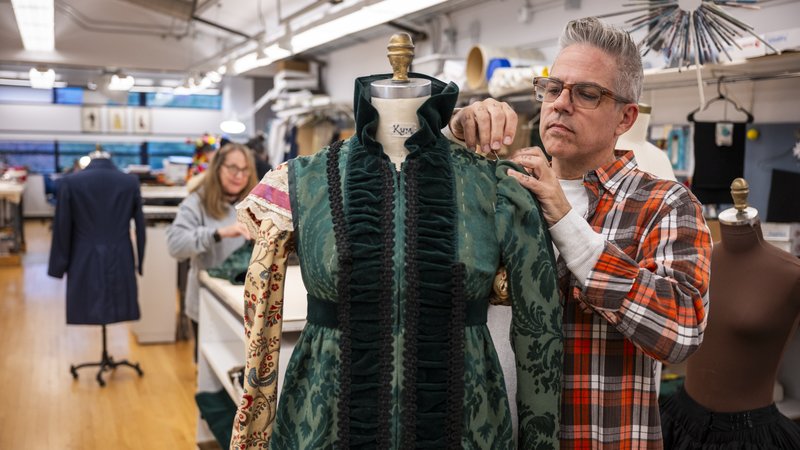 Draper/Tailer DJ Gramann II works on a costume in the Guthrie's in-house costume shop.