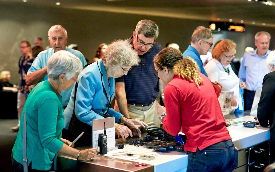Audiences at Guest Services Desk before a Relaxed Performance