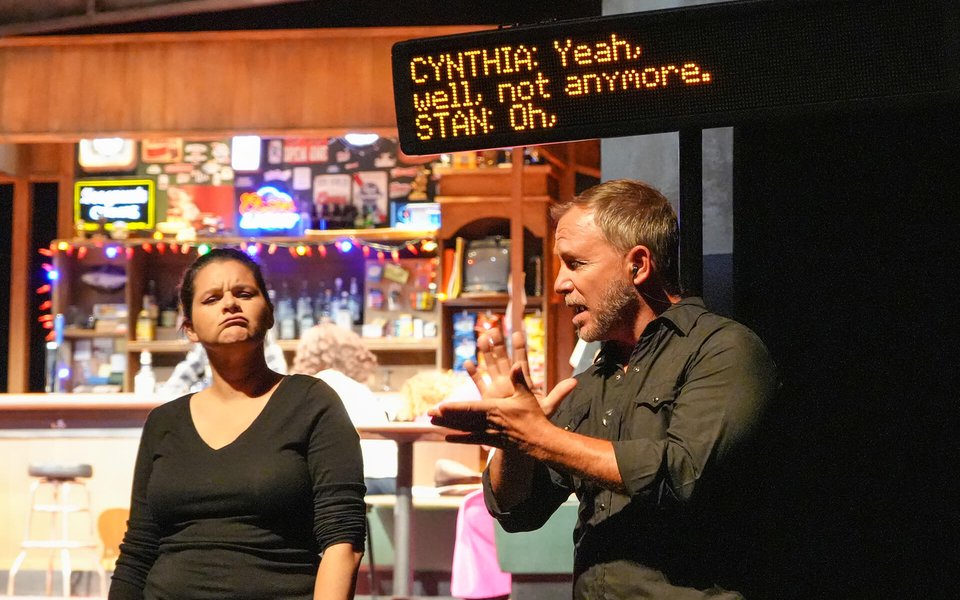 ASL Interpreters during a performance at the Guthrie