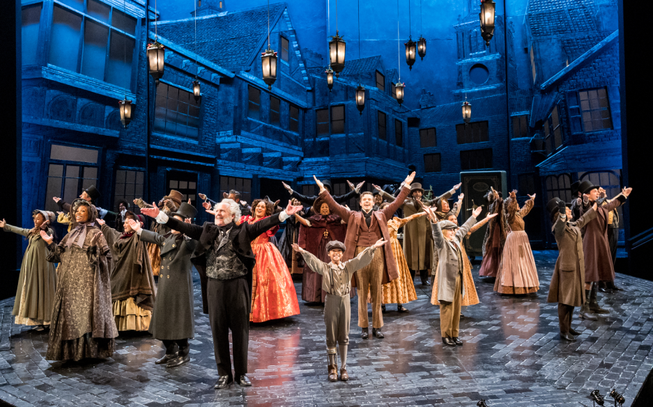 The company of A Christmas Carol performing an opening number