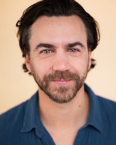 A headshot of Daniel Petzold