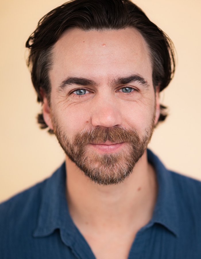 A headshot of Daniel Petzold