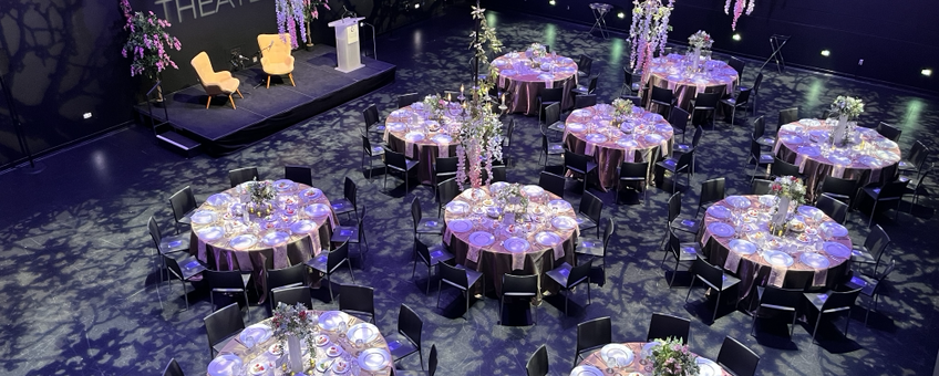 An opening night celebration tablescape in the Dowling Studio
