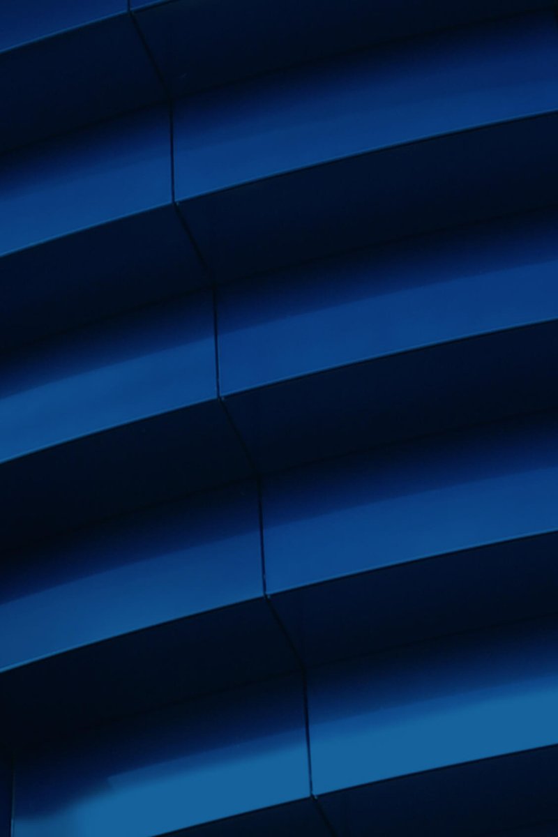 The exterior of the Guthrie building showing blue steps on the side of the building.