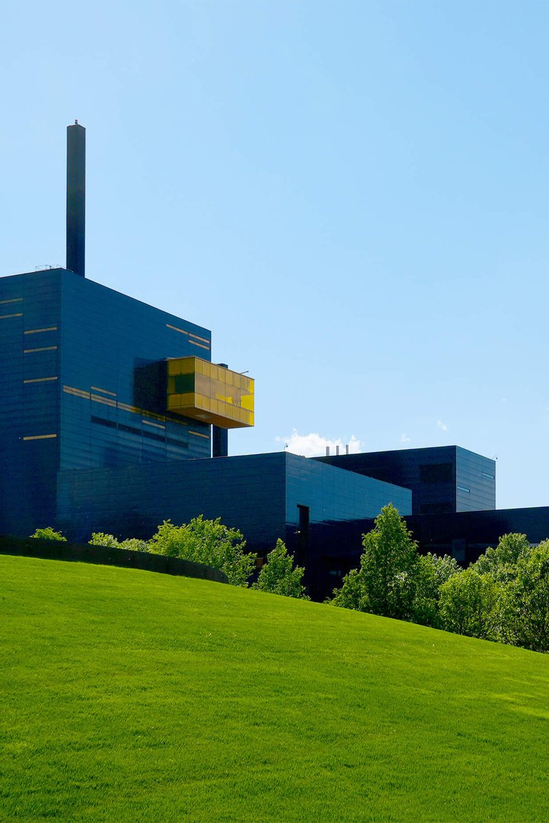 The Guthrie building photographed from Gold Medal Park on a sunny day
