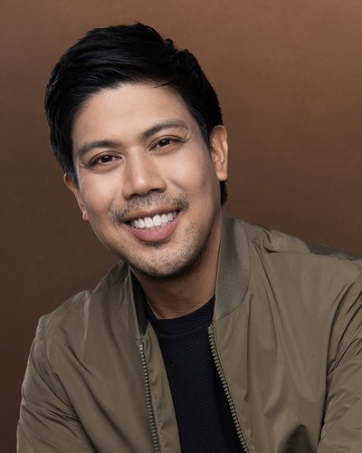 A headshot of J. Oconer Navarro