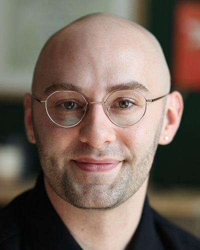 A headshot of Joey Miller