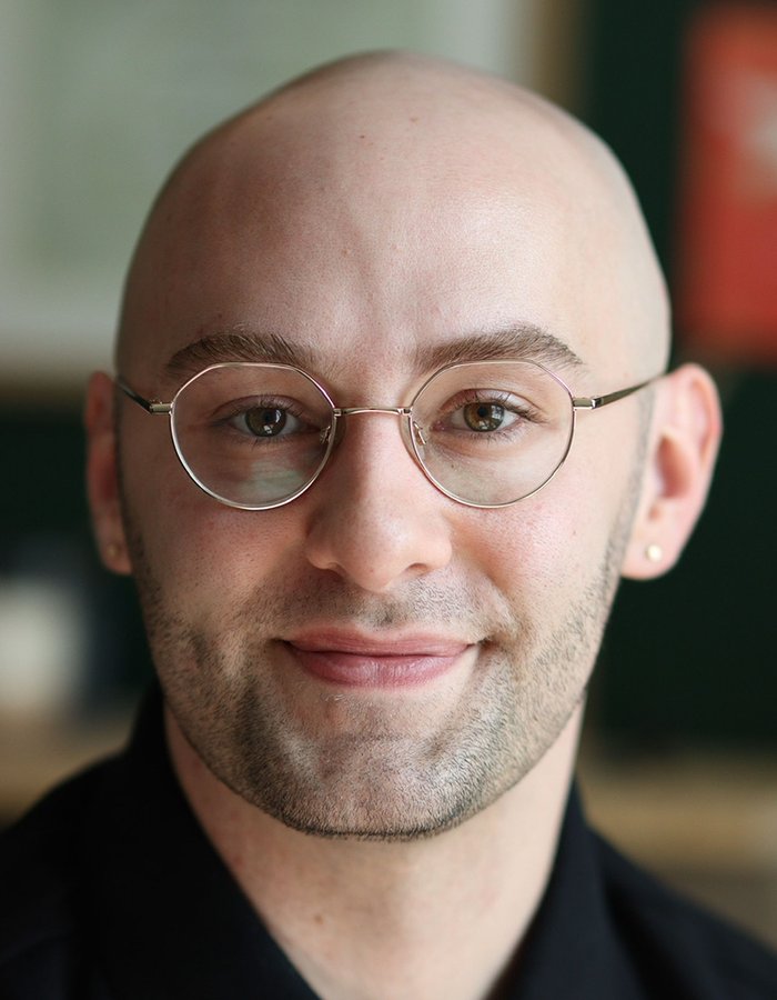 A headshot of Joey Miller