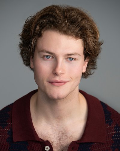 A headshot of Logan Lang