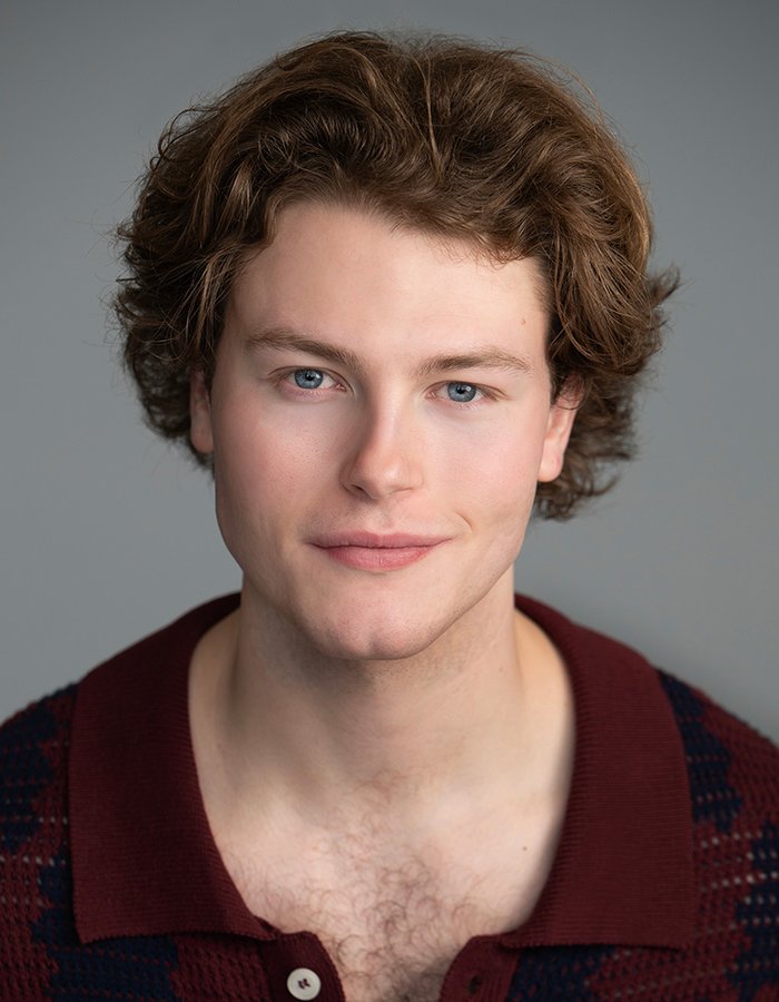 A headshot of Logan Lang