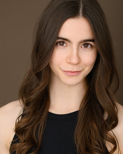 A headshot of May Heinecke