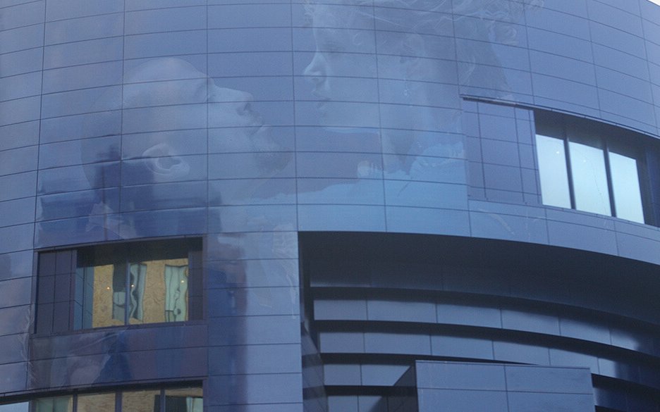 The exterior walls feature eight production images that are screen-printed on steel panels and intended to come to life in the evening light