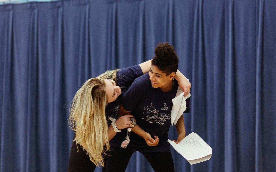 Two summer campers work on a scene during an acting camp (Nathan Dale Studios)