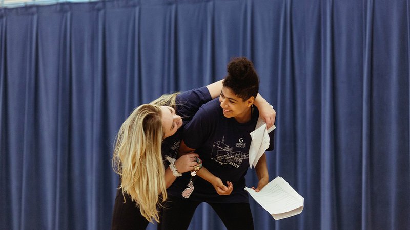 Two summer campers work on a scene during an acting camp (Nathan Dale Studios)